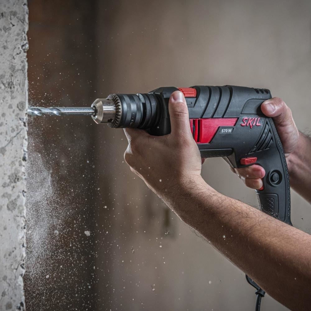 Furadeira Impacto 1/2" + 14 Brocas 570w Skil 6555